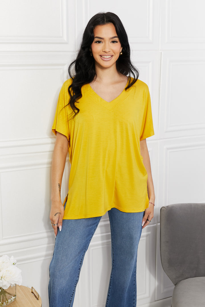 Yelete Full Size V-Neck Side Slit Tee Banana Yellow